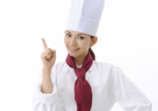 自信伸出手指的美女厨师图片
