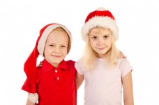 圣诞女孩戴着圣诞帽的男孩与女孩图片