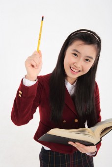 开学图片捧着书籍举着铅笔的长发女孩图片图片